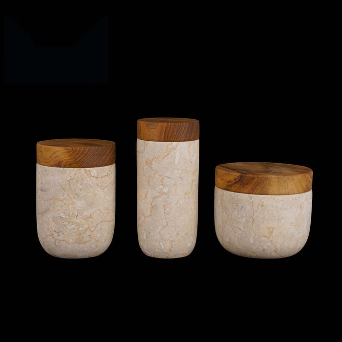 Set of 3 glossy marble pots with wooden lids displayed in a row on a black background