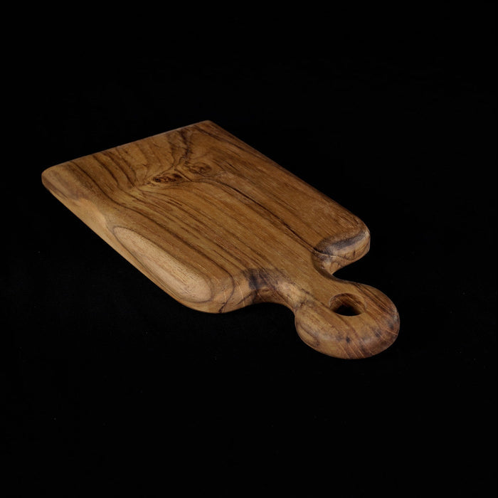 Rico & Plato onilemo teak cutting board serving platter displayed on a black background