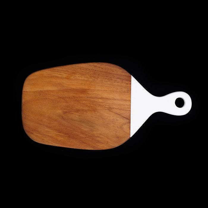 Front view of teak cutting board with white handle displayed horizontally on a black background