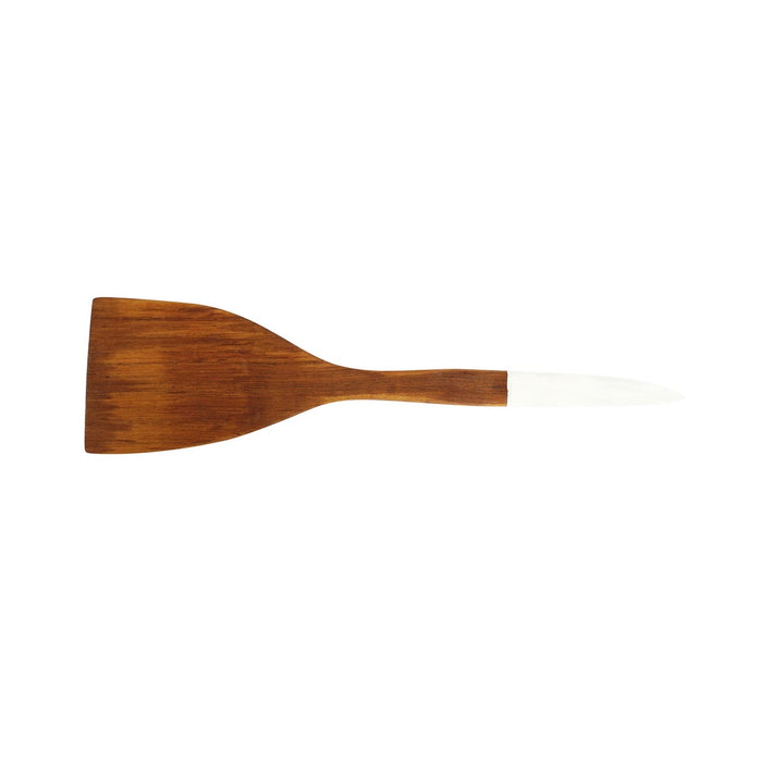 Top view of Rico & Plato resto teak spatula with white handle displayed on a white background