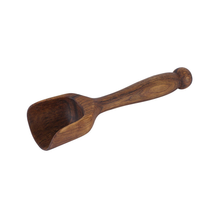 Small teak lentil scoop with long handle displayed on a white background