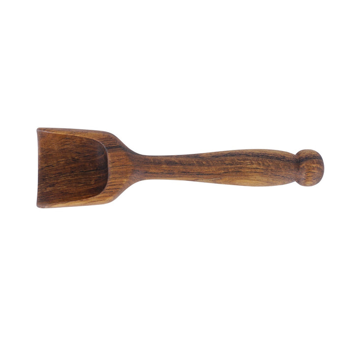 Top view of small teak lentil scoop with long handle displayed horizontally on a white background