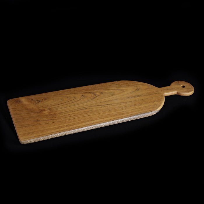 Rico & Plato sorrel teak cutting board serving platter displayed on a black background