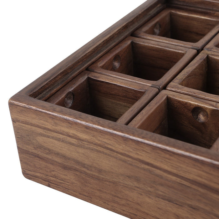 Close up of a corner side of Rico & Plato teak spice box displayed on a white background