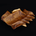 Rico & Plato vignerons teak wine bottle holder displayed on a black background