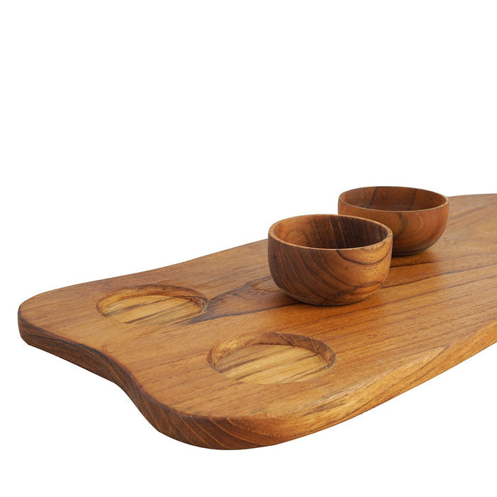Wooden serving board with two bowls on a white background