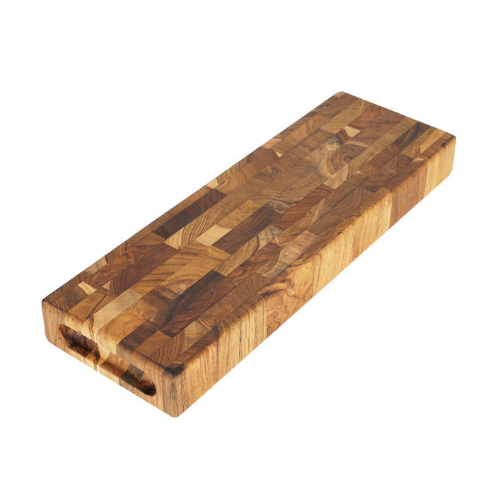 Rectangular end grain teak cutting board displayed on a white background