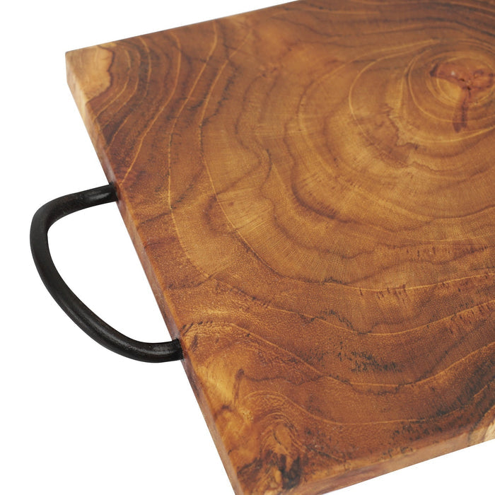 Close up of iron handle of Rico & Plato yuka teak trivet displayed on a white background