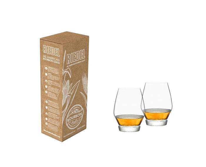 Riedel bourbon glass set with packaging on a white background