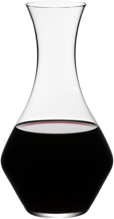 Riedel cabernet decanter with red wine inside on a white background