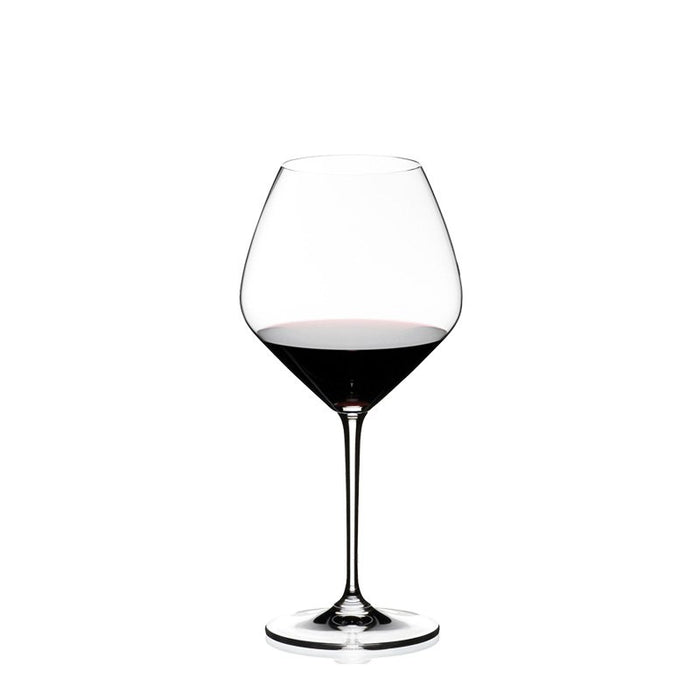 Riedel Pinot noir wine glass with red wine inside on a white background