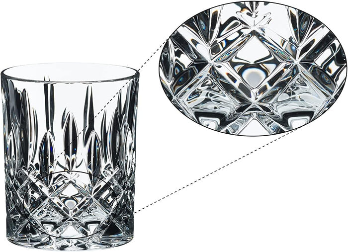 Riedel fine crystal tumbler spey whisky glass with a close up of the geometric pattern on a white background
