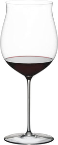 Riedel Superleggero Burgundy Grand wine glass with red wine inside on a white background
