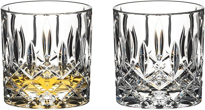 A set of two RIEDEL Spey Single Old Fashioned glass tumblers with a clear crystal design filled with liquid, displayed against a white background.
