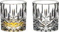 A set of two RIEDEL Spey Single Old Fashioned glass tumblers with a clear crystal design filled with liquid, displayed against a white background.