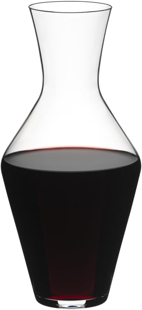 A clear Riedel Veloce decanter filled with red wine, designed to hold a single bottle of wine.