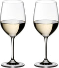 Two clear stemmed wine glasses filled with white wine, shown side by side on a plain white background.