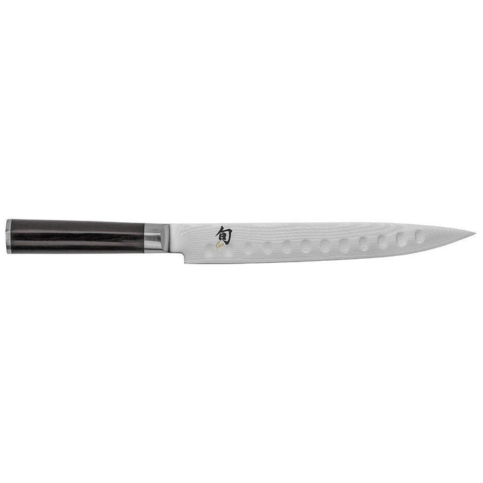 Shun Classic Hollow Edge Slicing Knife - 9″ displayed horizontally on white background