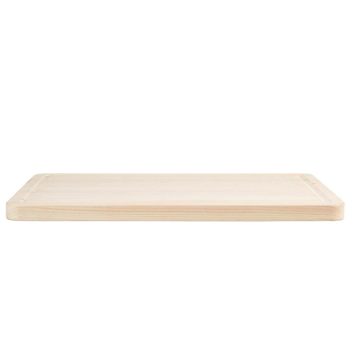 Side view of Shun Hinoki Cutting Board displayed on a white background