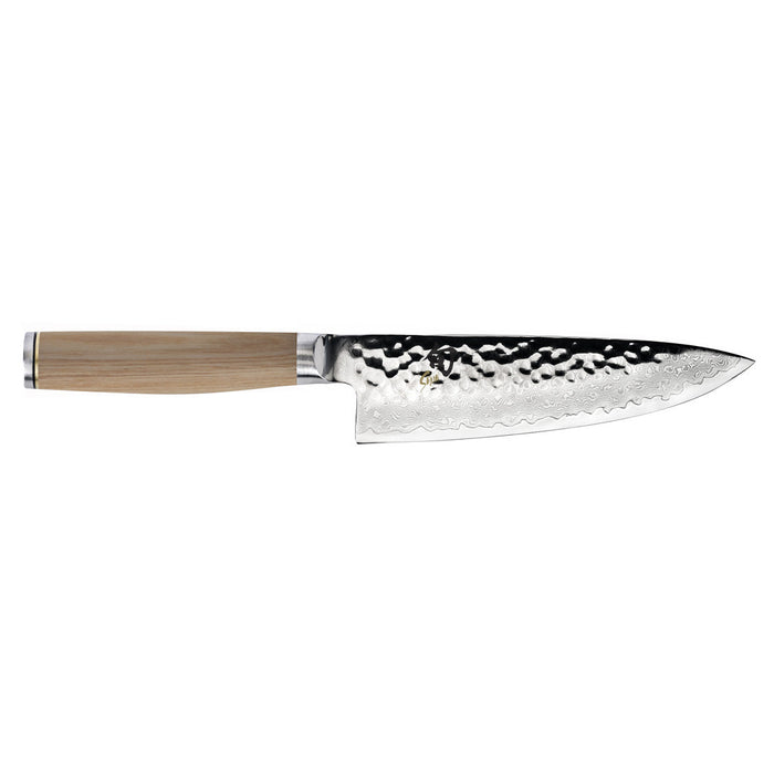 6 inch Shun premier chef knife with blonde handle displayed horizontally on a white background