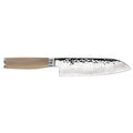 7 inch Shun premier santoku knife with blonde handle displayed horizontally on a white background
