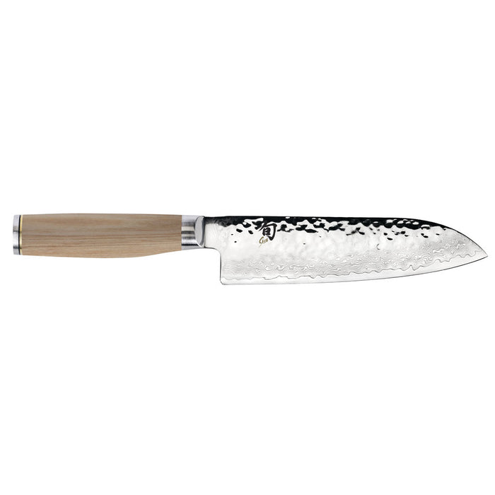 7 inch Shun premier santoku knife with blonde handle displayed horizontally on a white background