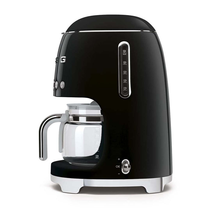 Side view of black Smeg coffee machine on a white background