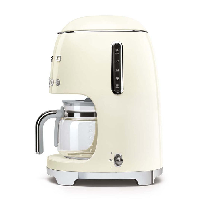 Side view of cream Smeg coffee machine on a white background