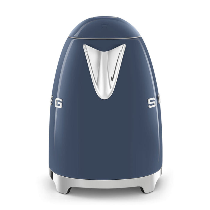 Side view of navy blue Smeg 50s retro line electric kettle displayed on a white background