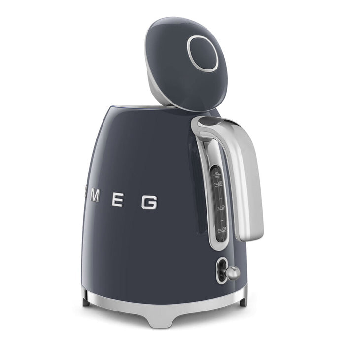 Navy blue Smeg 50s retro line electric kettle with lid open displayed on a white background