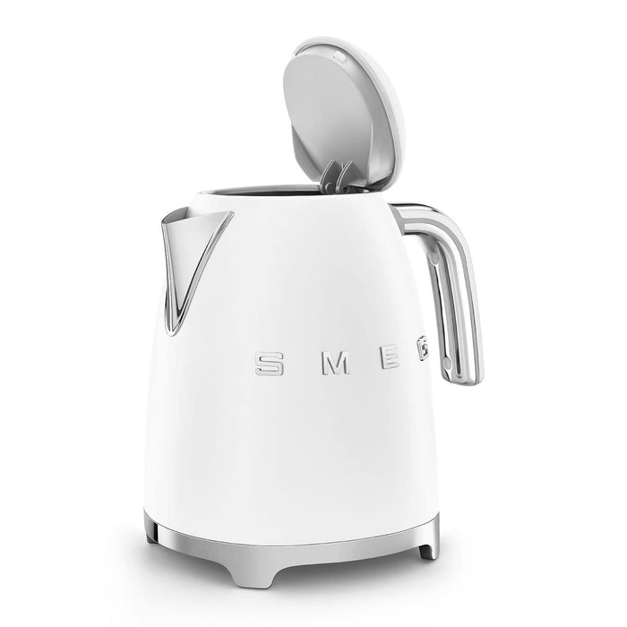 White Smeg 50s retro line electric kettle with lid open displayed on a white background