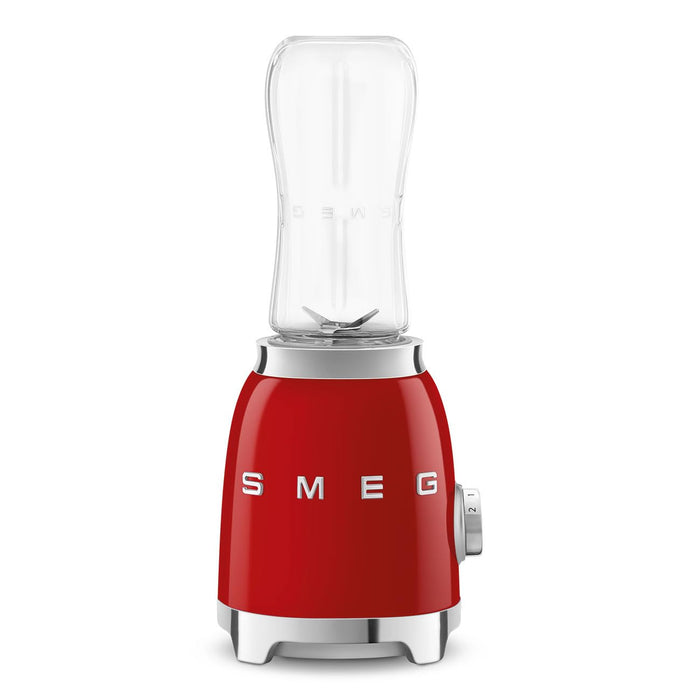 Red Smeg retro line personal blender on a white background