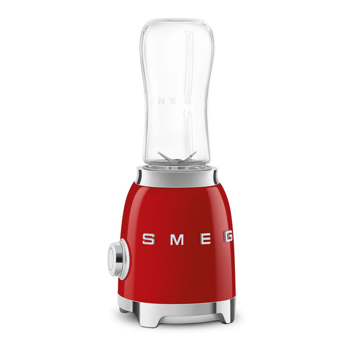 Red Smeg retro line personal blender on a white background