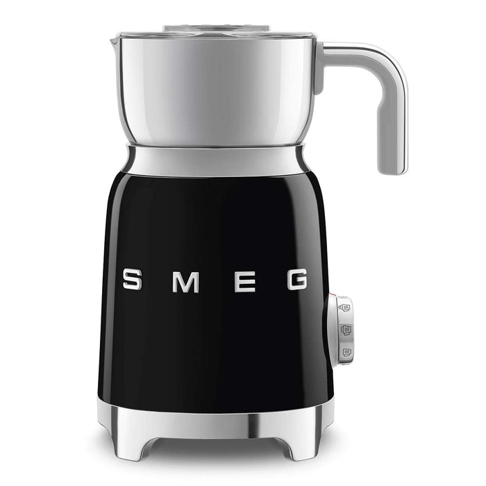Front view of black Smeg milk frother with silver top on a white background