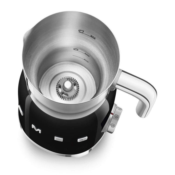 Top view of black Smeg milk frother with silver top displayed on a white background