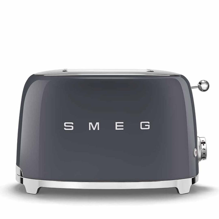 Front view of dark gray Smeg toaster on a white background