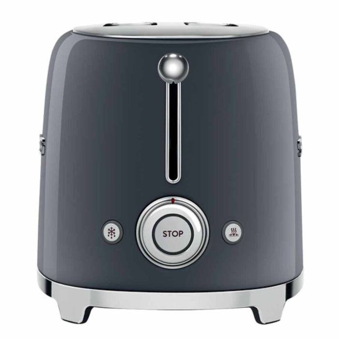 Side view of dark gray toaster with silver accents and a control dial on a white background