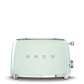 Front view of mint green toaster with 'SMEG' branding on a white background