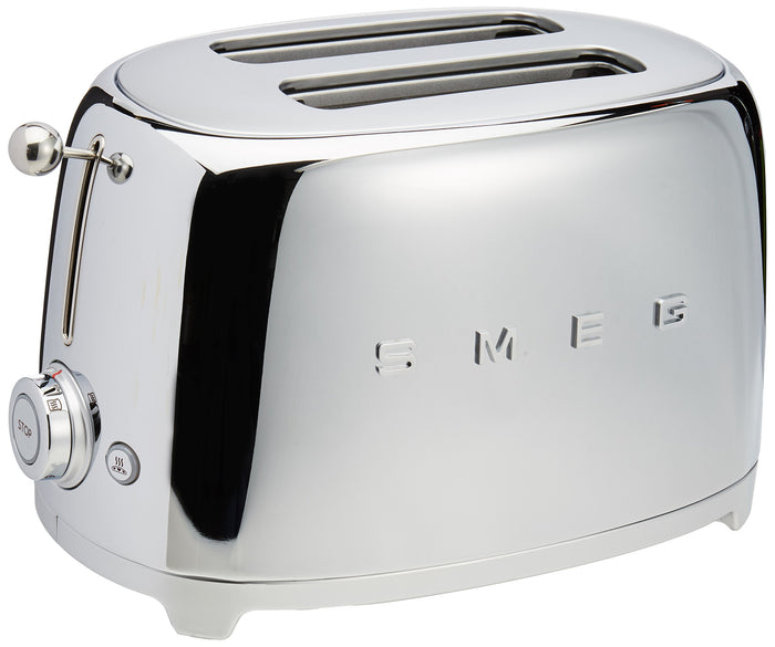 Stainless steel toaster with 'Smeg' branding on a white background
