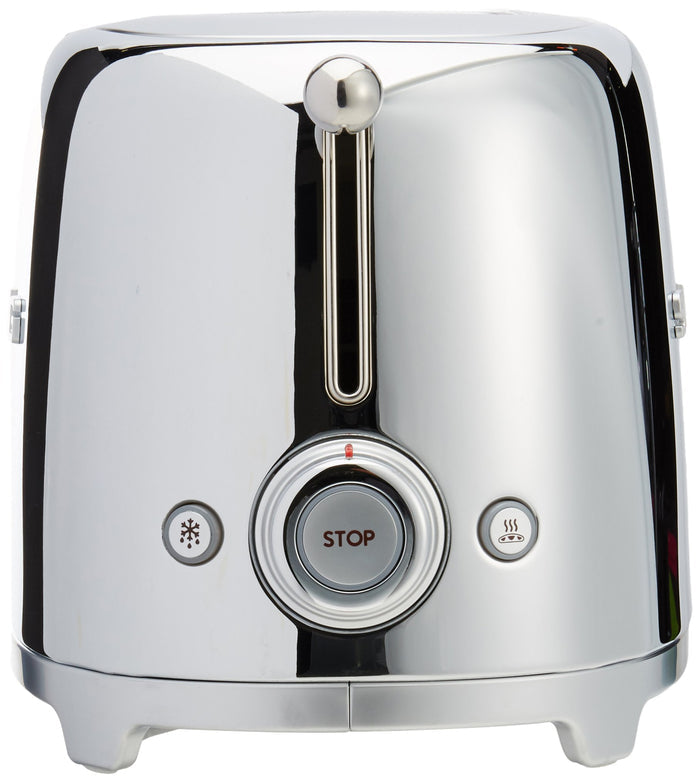 Side view of stainless steel Smeg toaster with a stop button on a white background