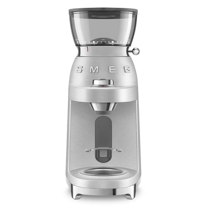 Front view of a stainless steel Smeg retro style electric espresso coffee grinder on a white background