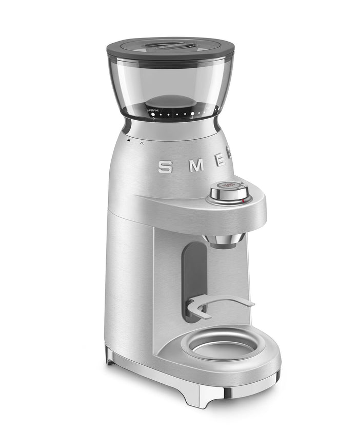 Stainless steel Smeg retro style electric espresso coffee grinder on a white background