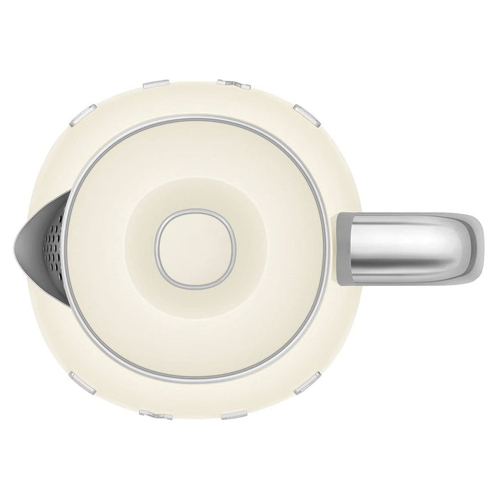 Top view of Smeg cream-colored kettle with metallic accents on a white background