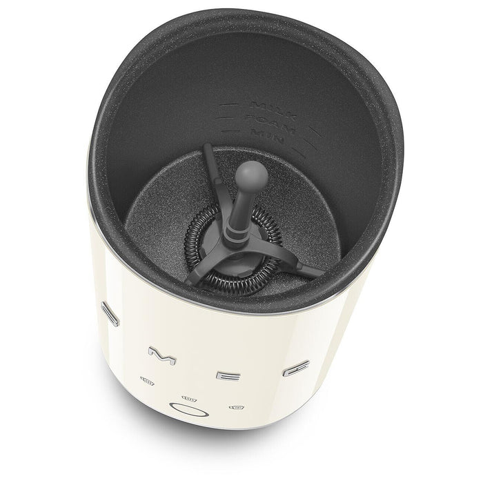 Top view of cream SMEG milk frother displayed on a white background
