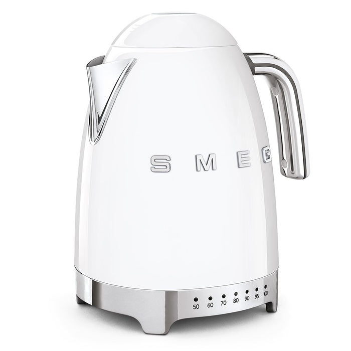 White Smeg electric kettle with silver accents on a white background