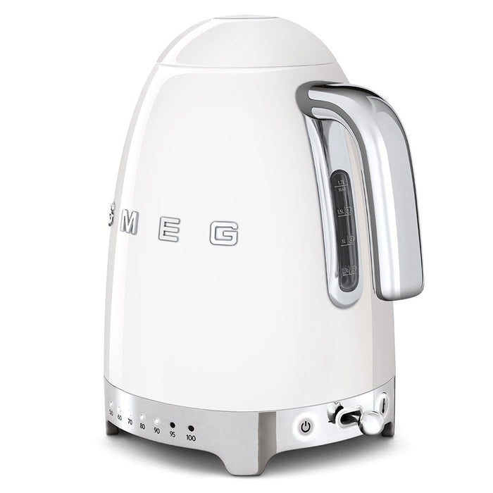 White Smeg electric kettle with metallic accents on a white background