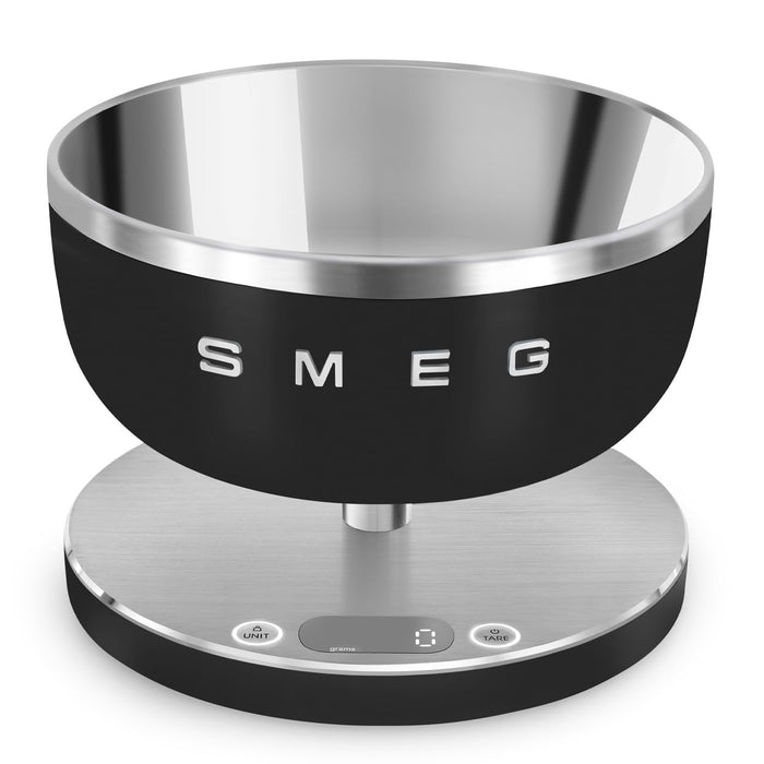 A SMEG branded digital kitchen scale with a modern matte black finish and a detachable stainless steel bowl.