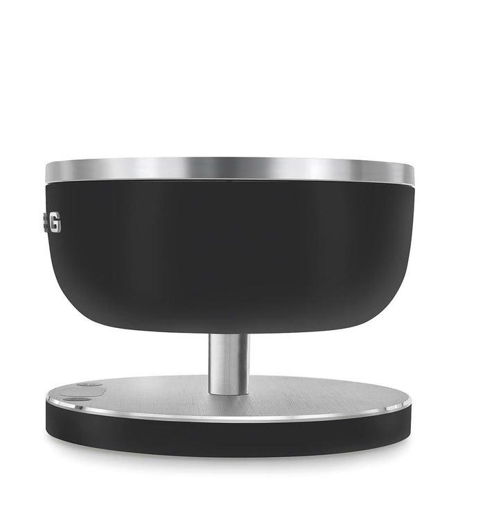 Side view of a matte black Smeg contemporary kitchen scale on a white background