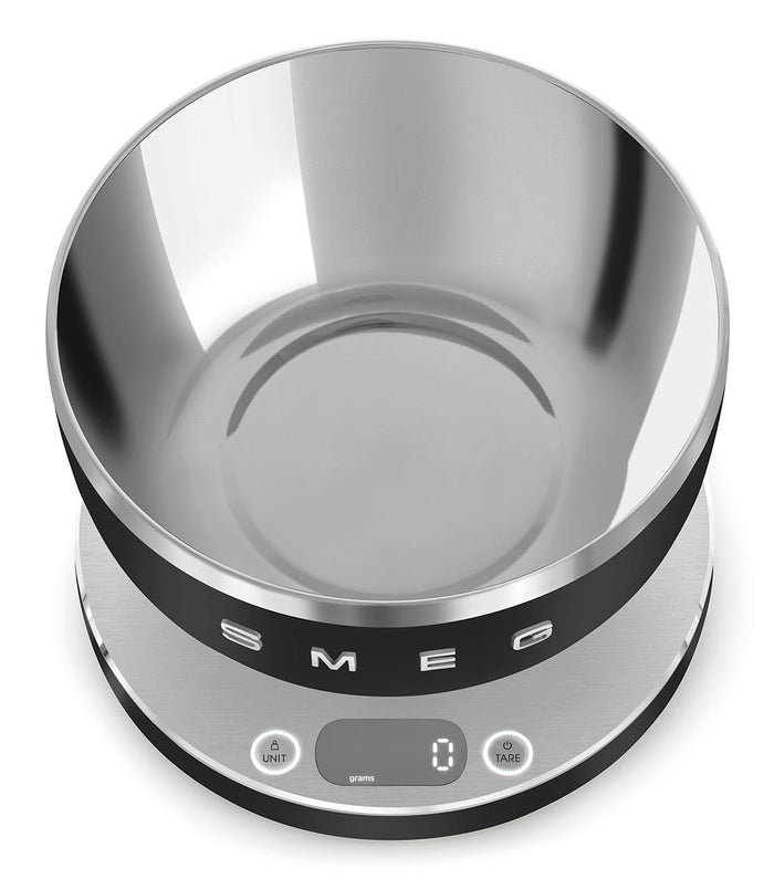Top view of a matte black Smeg contemporary kitchen scale on a white background