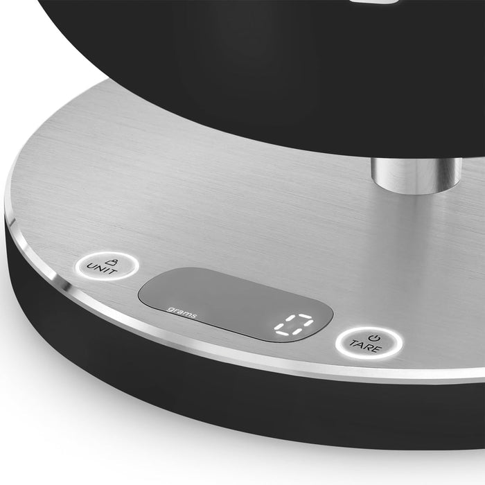 Close up of a digital control panel on a matte black Smeg contemporary kitchen scale on a white background